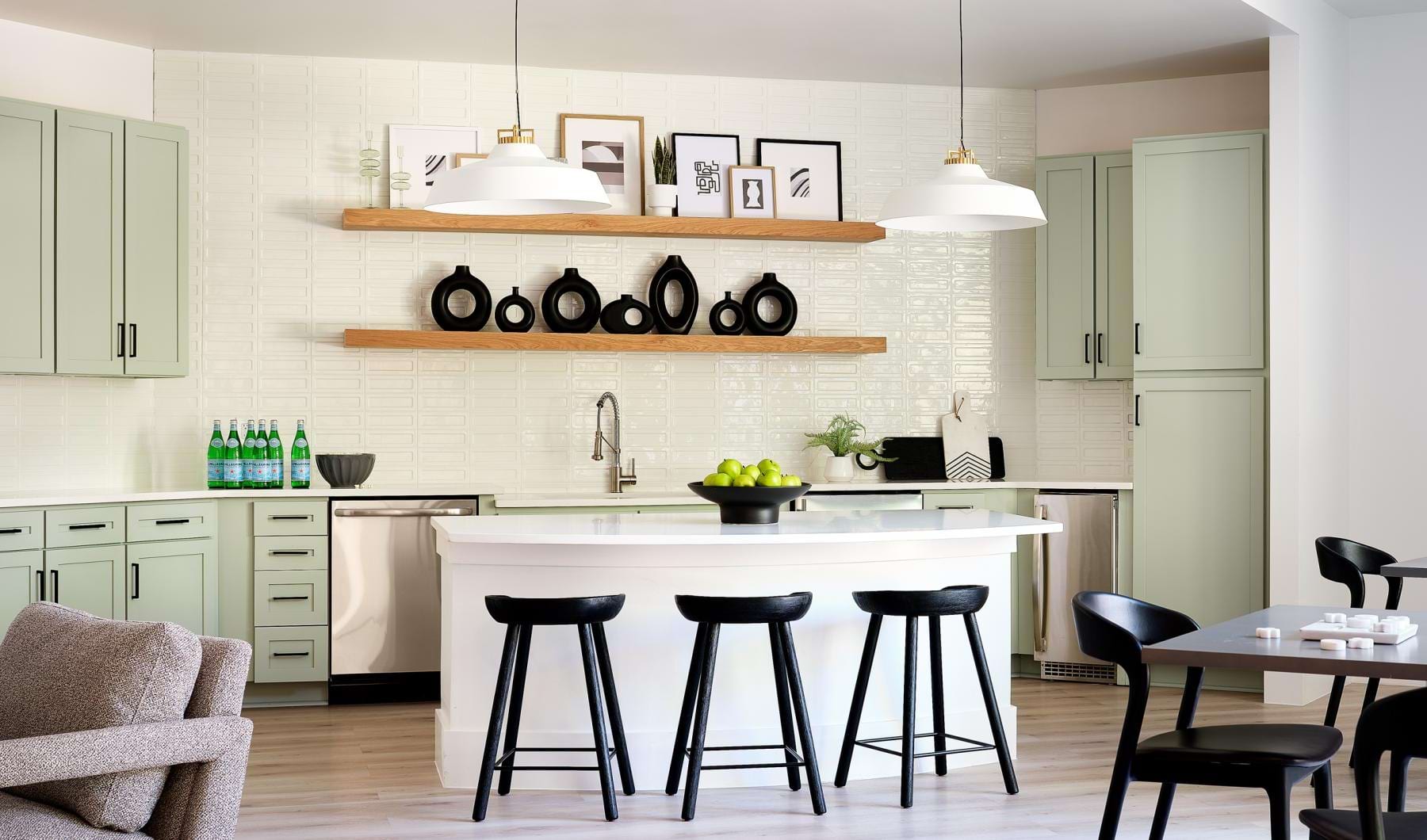 a kitchen with a table and chairs